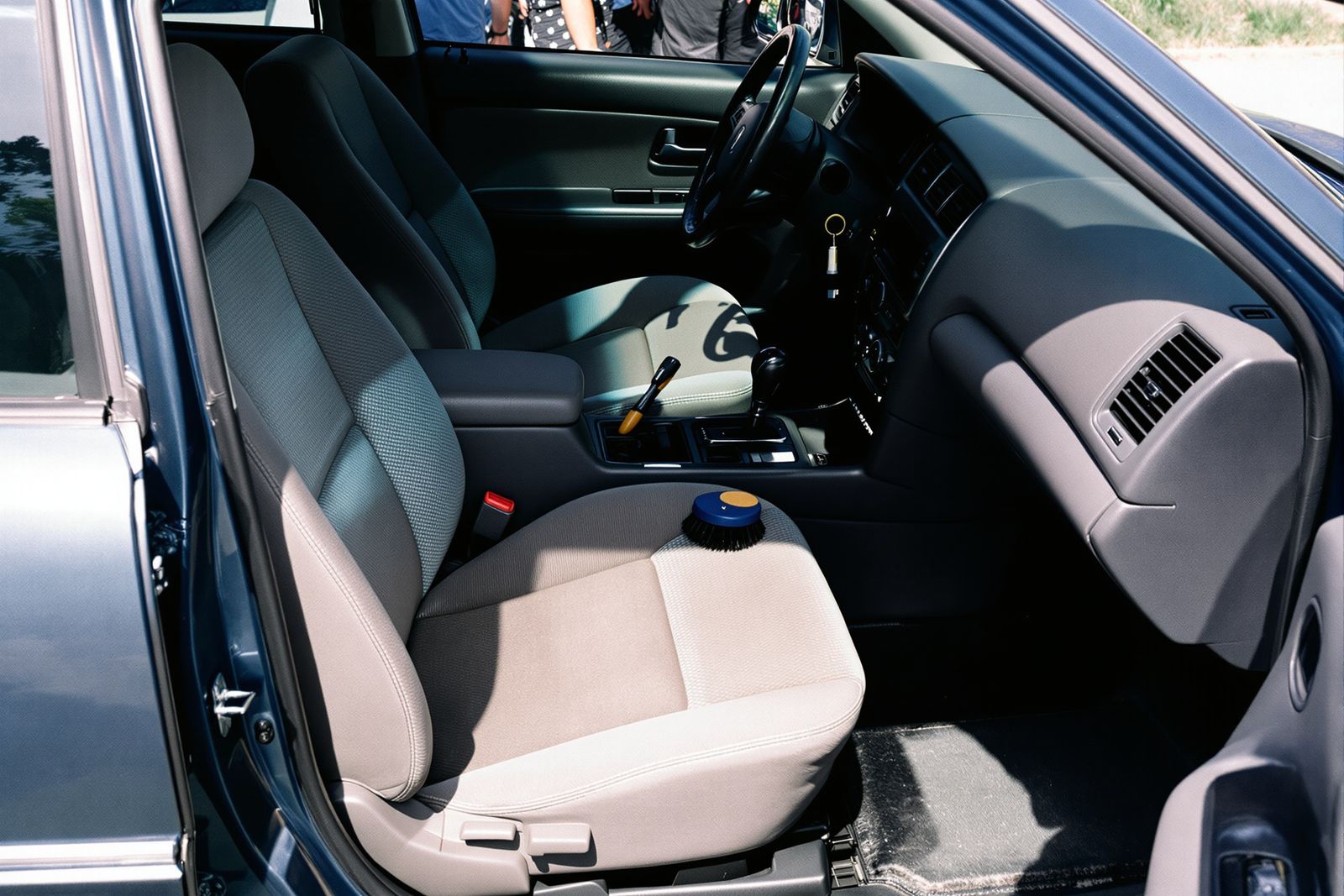 PLACEHOLDER — shot list for the real photographer: car upholstery being extracted, wand on the seat
