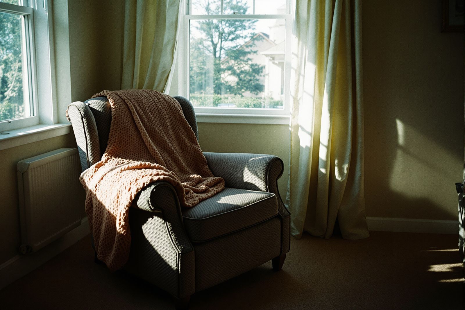 PLACEHOLDER — shot list for the real photographer: an upholstered armchair mid clean, one arm done and one not, in a real front room